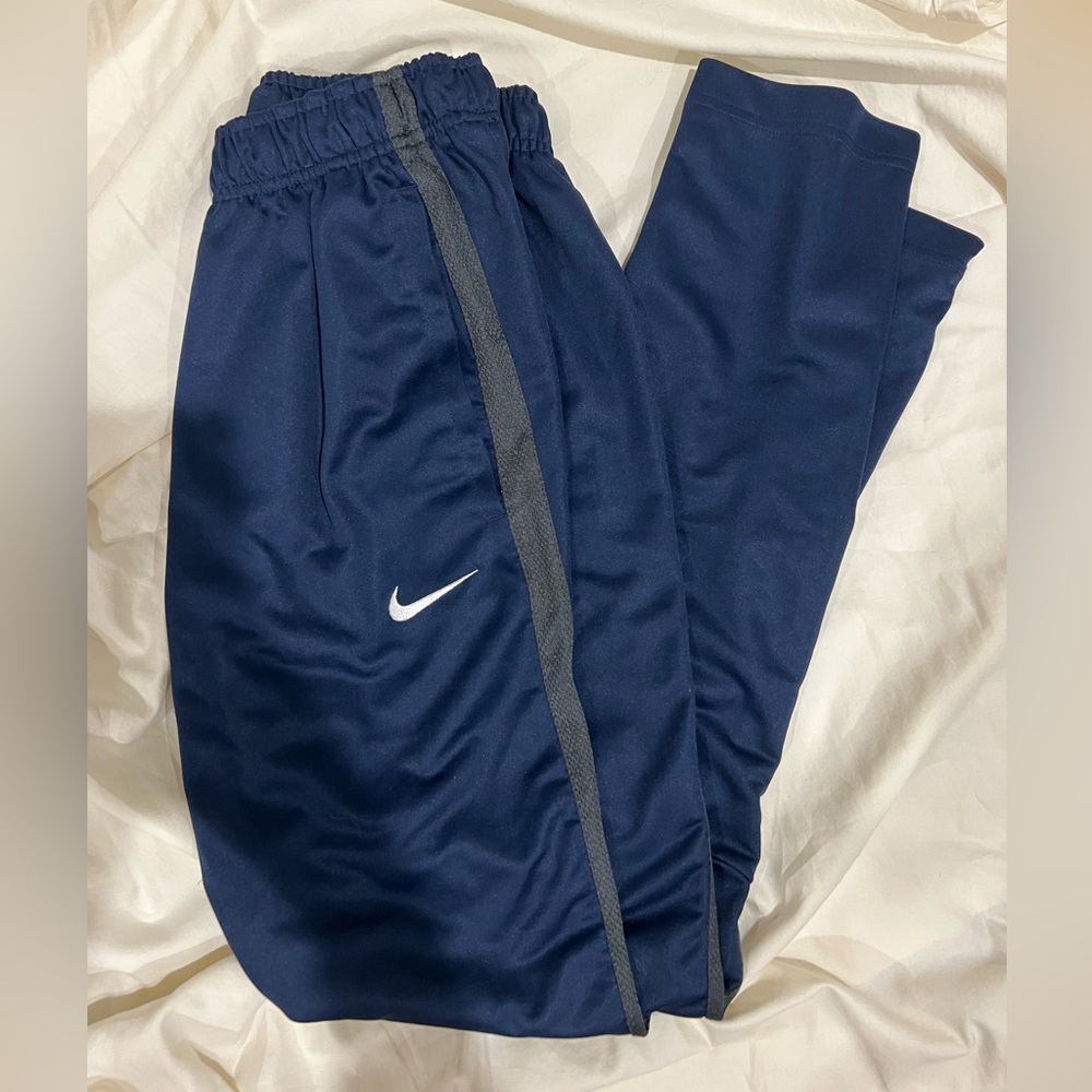 Blue Nike trackpants